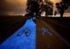 Vivid Blue Bicycle Lane That Is Recharged By The Sun